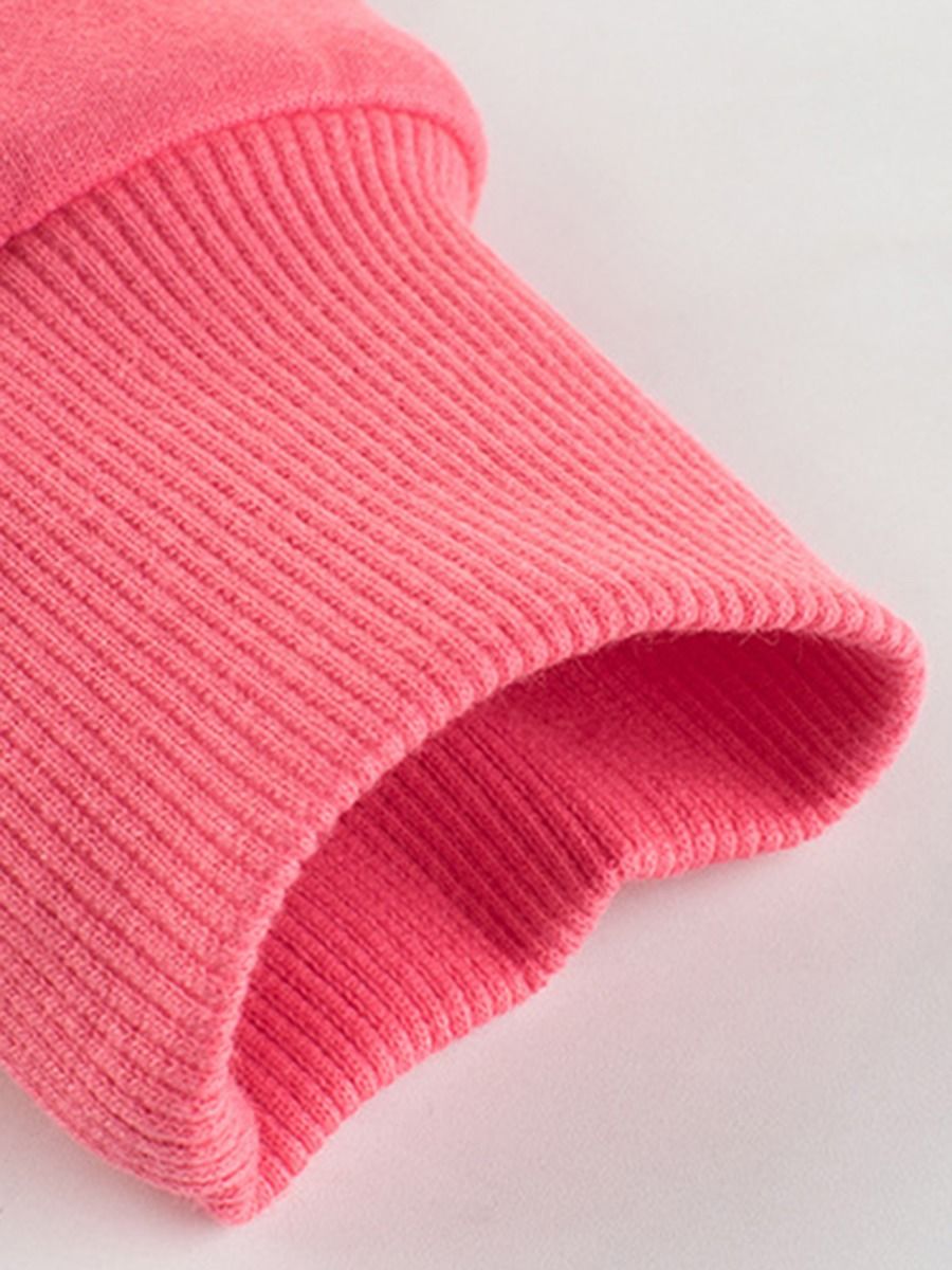 peach colored sweatshirt